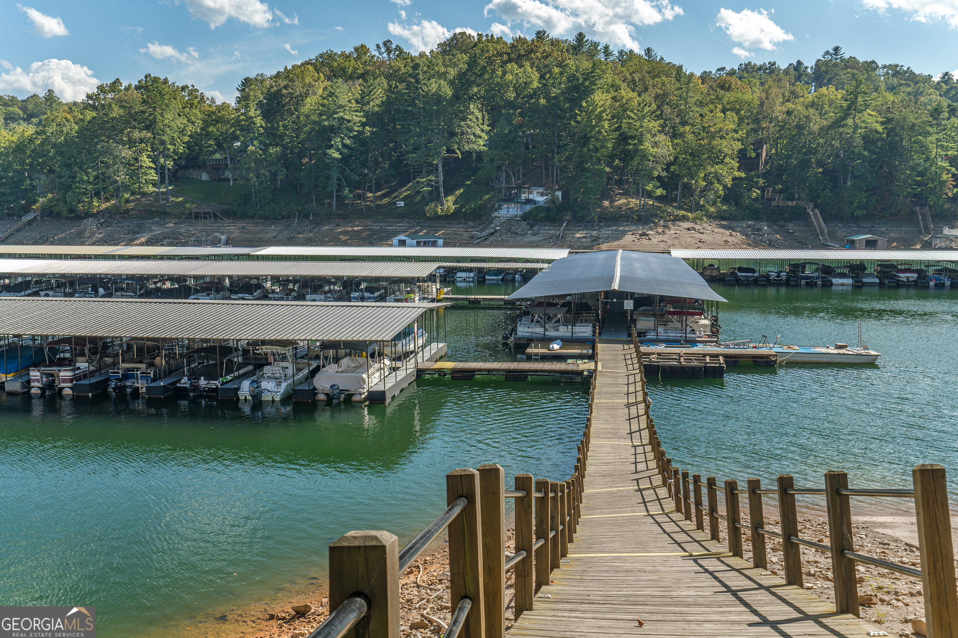 15 Lonesome Pine Road Murphy, NC 28906 - Photo 52 of 61 a view of a lake with a house in the background
