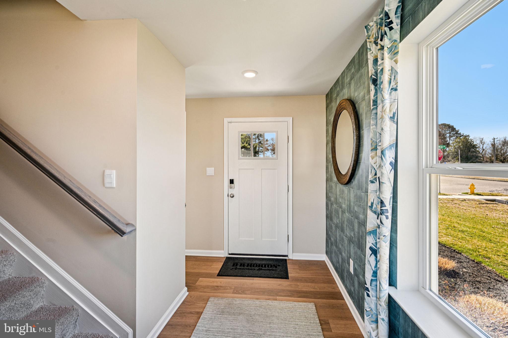 1153 Wintermead Loop Salisbury, MD 21801 - Photo 2 of 33 a view of a hallway with windows