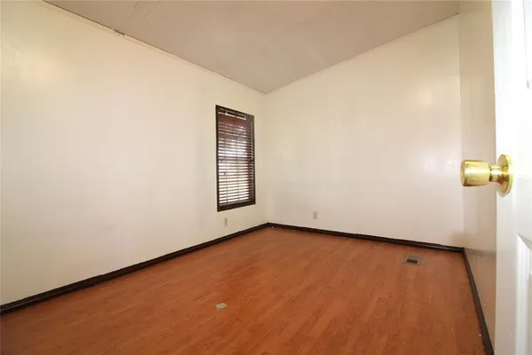 an empty room with a door