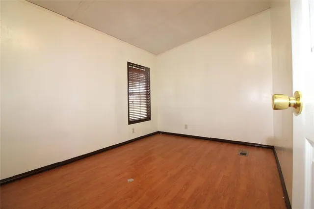 an empty room with a door