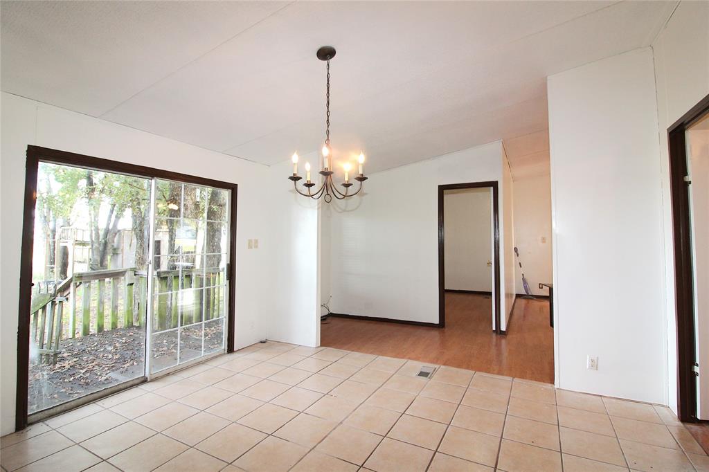 5199 Timarron Drive Scurry, TX 75158 - Photo 7 of 29 a view of an empty room with window