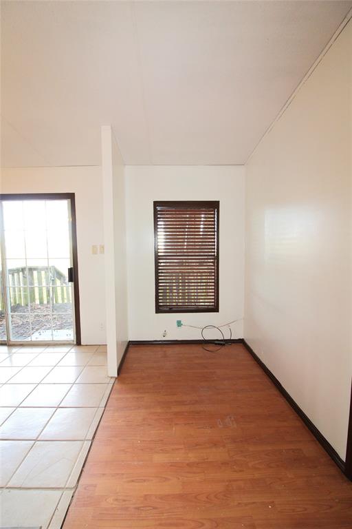 5199 Timarron Drive Scurry, TX 75158 - Photo 9 of 29 a view of an empty room and window