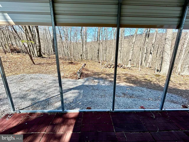 a view of a backyard of the house