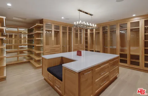a bathroom with a tub and a shower
