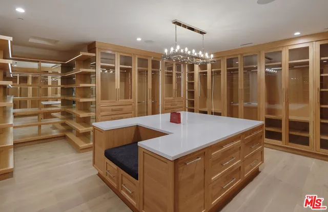 a bathroom with a tub and a shower