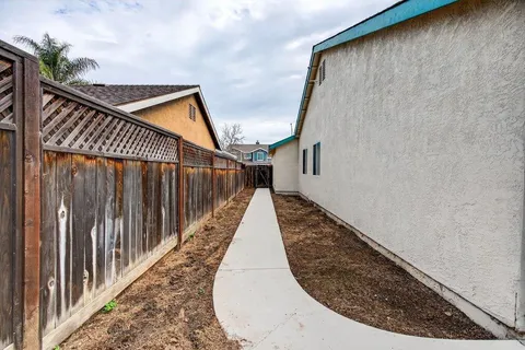 a view of balcony with wooden floor