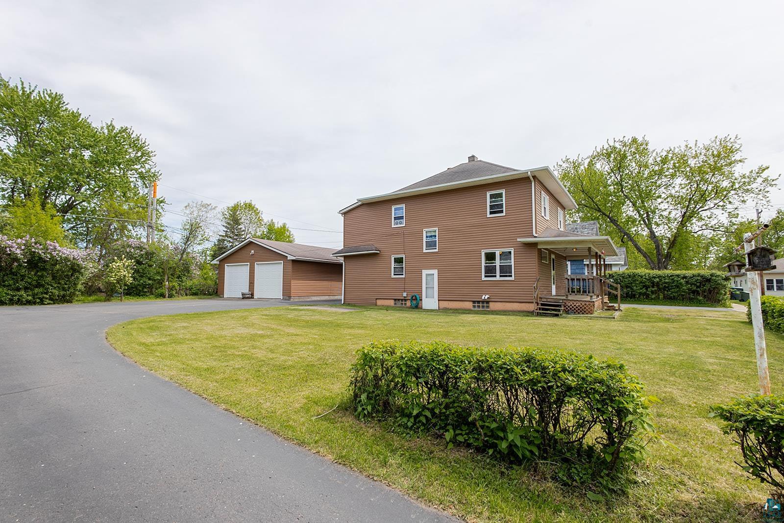 438 9th Street Cloquet, MN 55720 - Photo 3 of 27 Two-story property with brown siding and white trim