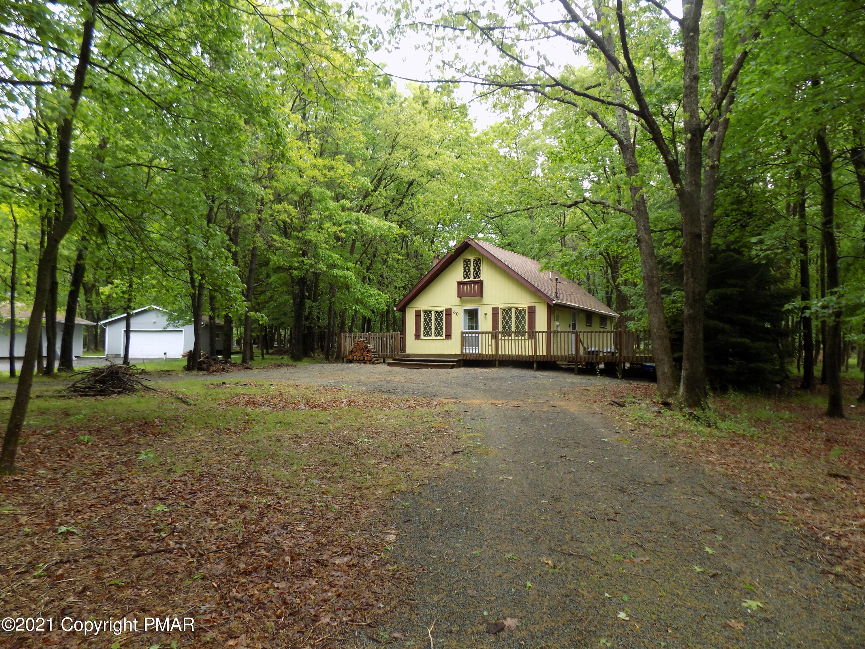 60 Buckhill Road Albrightsville, PA 18210 - Photo 13 of 13 a front view of a house with a yard and trees