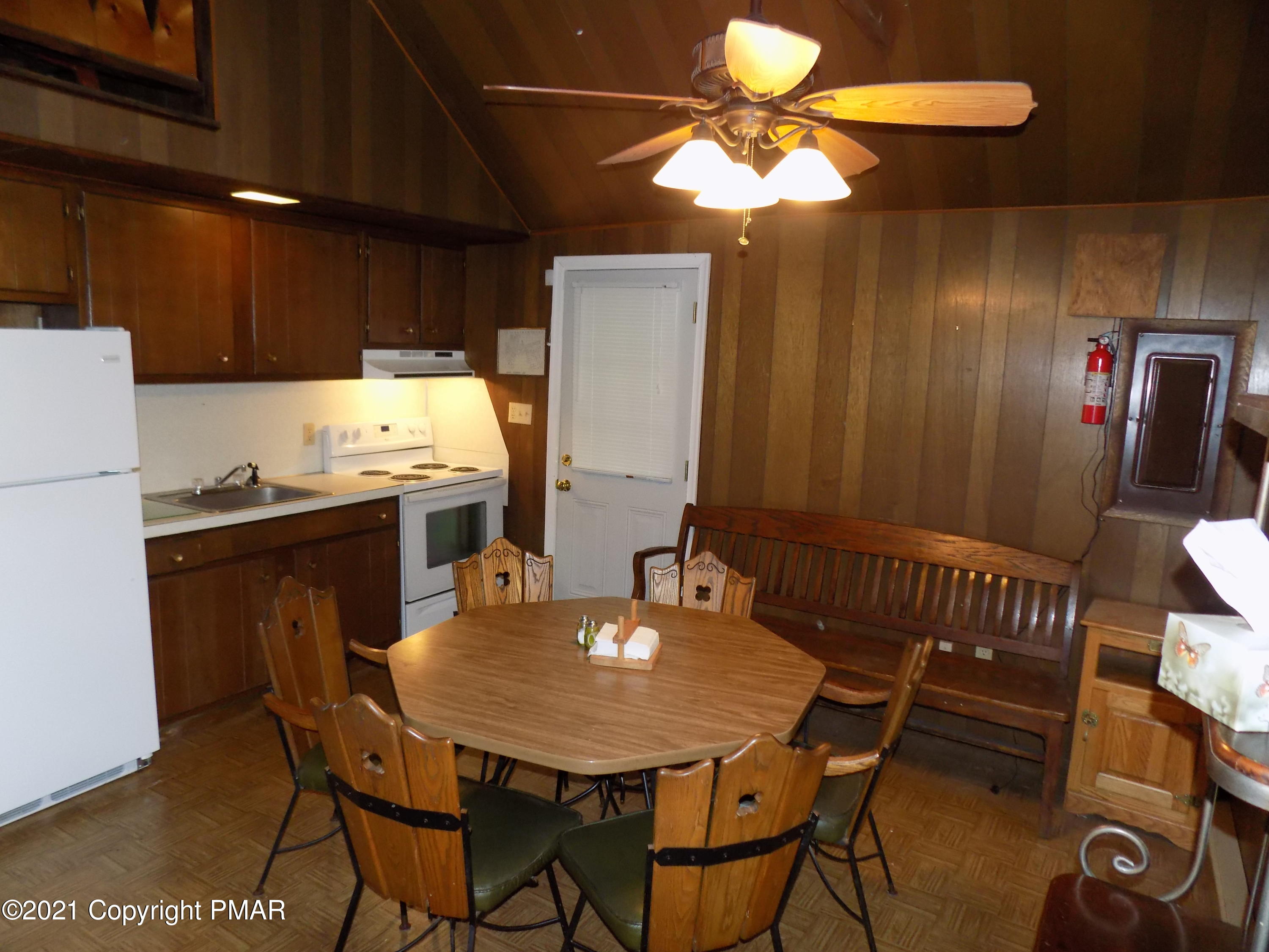 60 Buckhill Road Albrightsville, PA 18210 - Photo 2 of 13 a dining room with furniture and chandelier