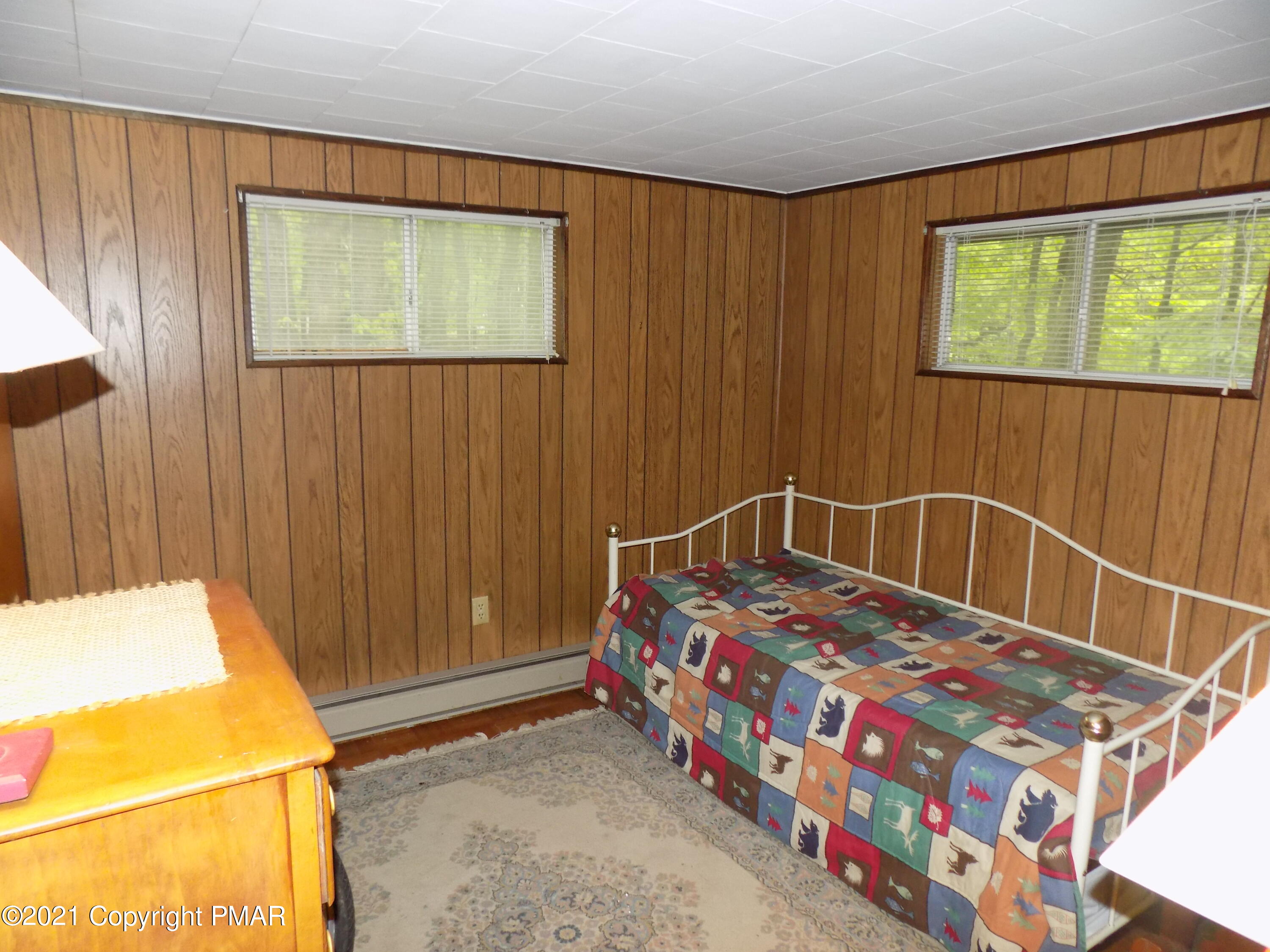 60 Buckhill Road Albrightsville, PA 18210 - Photo 7 of 13 a bedroom with a bed and a dresser