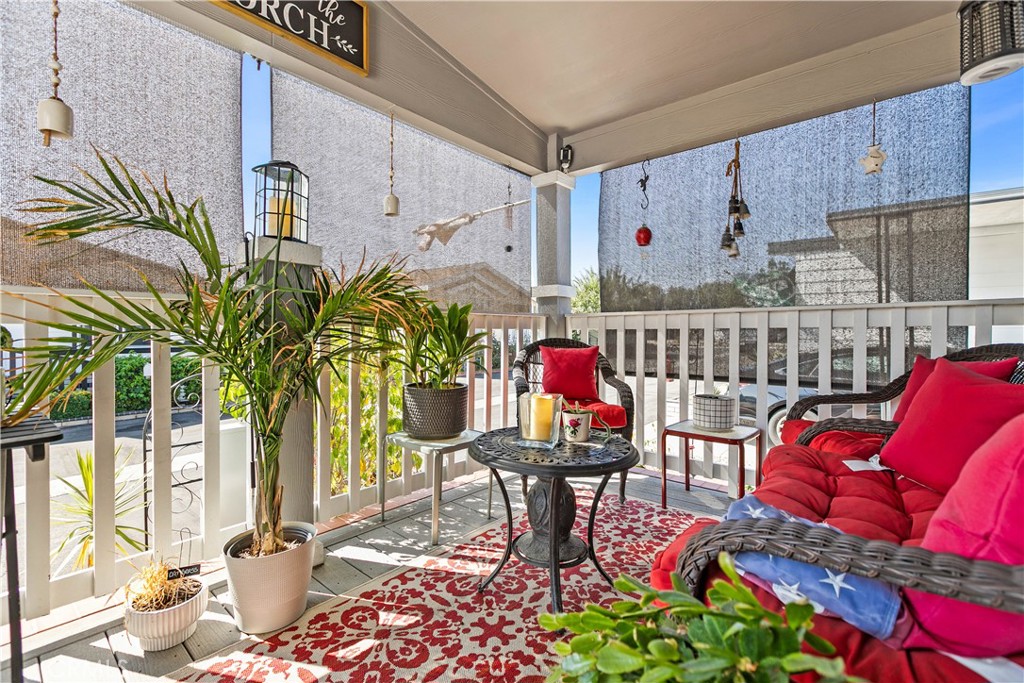 8651 Foothill Boulevard, Unit 82 Rancho Cucamonga, CA 91730 - Photo 12 of 56 a living room with furniture and a potted plant