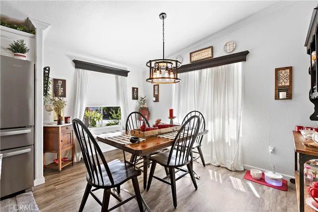 a kitchen with lots of counter top space and wooden floor