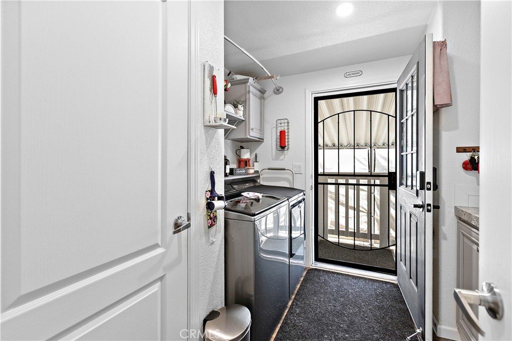8651 Foothill Boulevard, Unit 82 Rancho Cucamonga, CA 91730 - Photo 30 of 56 a kitchen with a refrigerator and a stove
