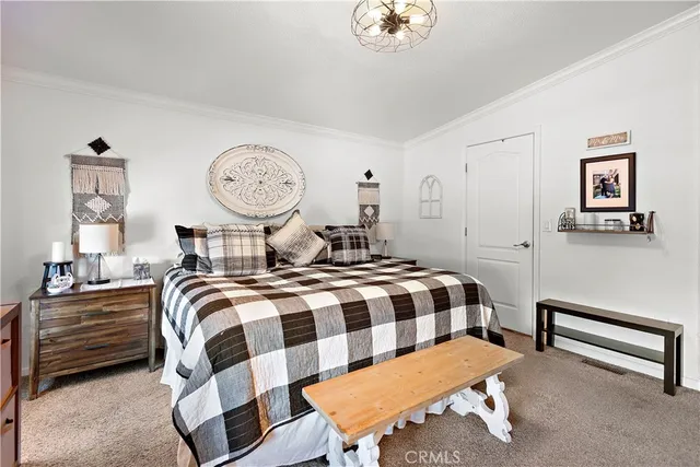 a view of backyard of house with seating space