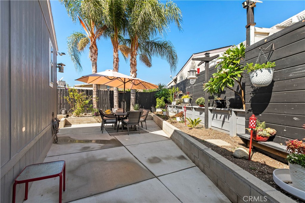 8651 Foothill Boulevard, Unit 82 Rancho Cucamonga, CA 91730 - Photo 39 of 56 a view of a chairs and tables in the patio