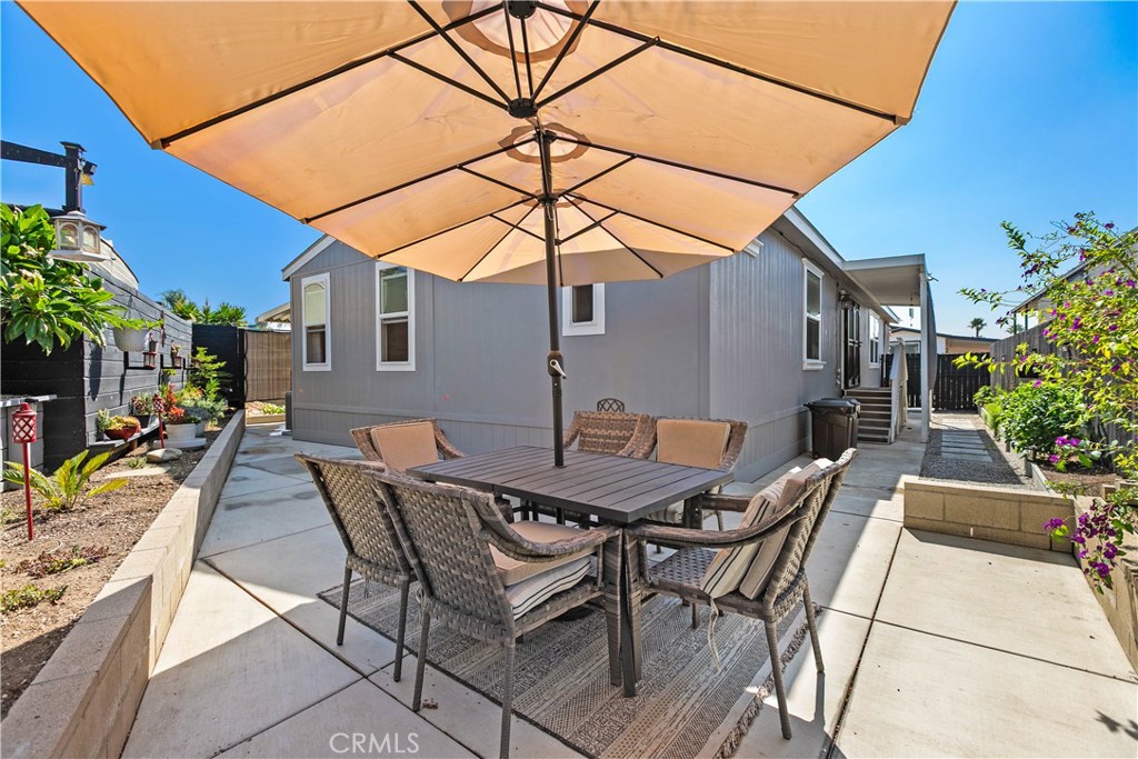 8651 Foothill Boulevard, Unit 82 Rancho Cucamonga, CA 91730 - Photo 40 of 56 a view of backyard of house with seating space