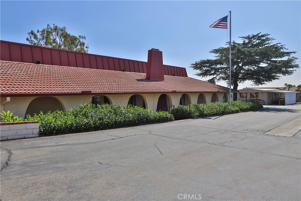 8651 Foothill Boulevard, Unit 82 Rancho Cucamonga, CA 91730 - Photo 45 of 56 front view of a house with a street
