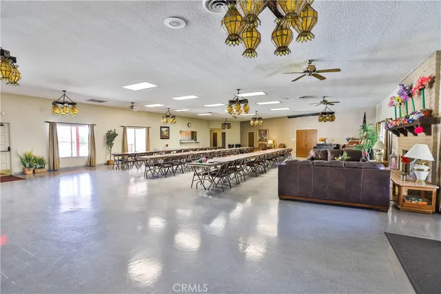 a house with swimming pool in front of it