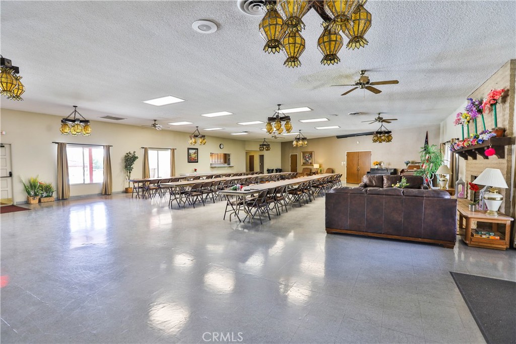 8651 Foothill Boulevard, Unit 82 Rancho Cucamonga, CA 91730 - Photo 47 of 56 a living room with furniture and a flat screen tv