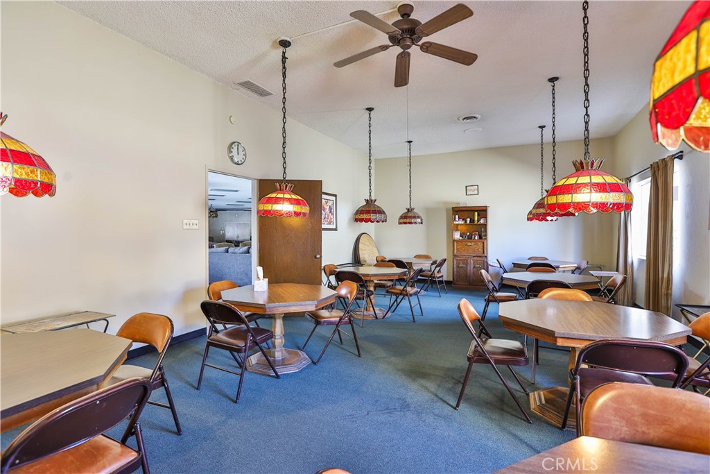 8651 Foothill Boulevard, Unit 82 Rancho Cucamonga, CA 91730 - Photo 51 of 56 a room with furniture and a flat screen tv