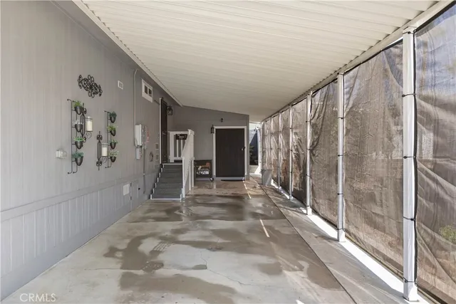 a view of entryway with flower pots