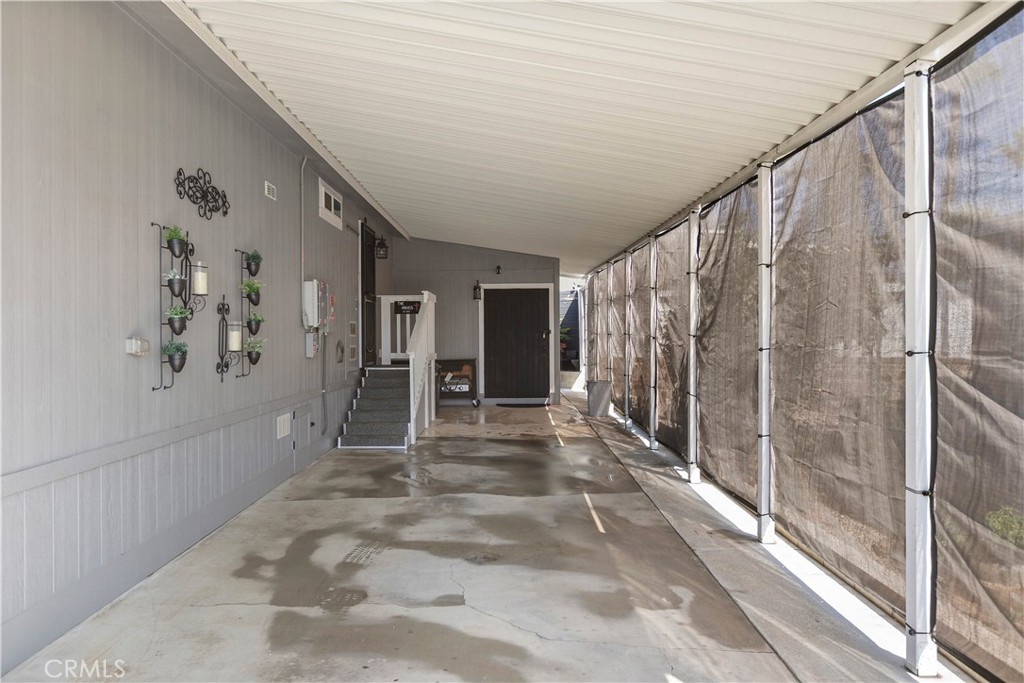 8651 Foothill Boulevard, Unit 82 Rancho Cucamonga, CA 91730 - Photo 7 of 56 a view of entryway with stairs and a window