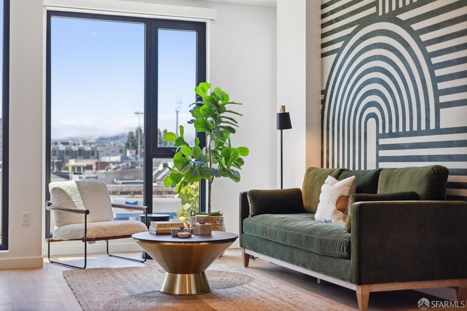 988 Harrison Street, Unit WE2 San Francisco, CA 94107 - Photo 6 of 18 a living room with furniture and a potted plant