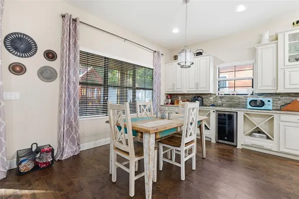 a kitchen with stainless steel appliances granite countertop a stove and a refrigerator