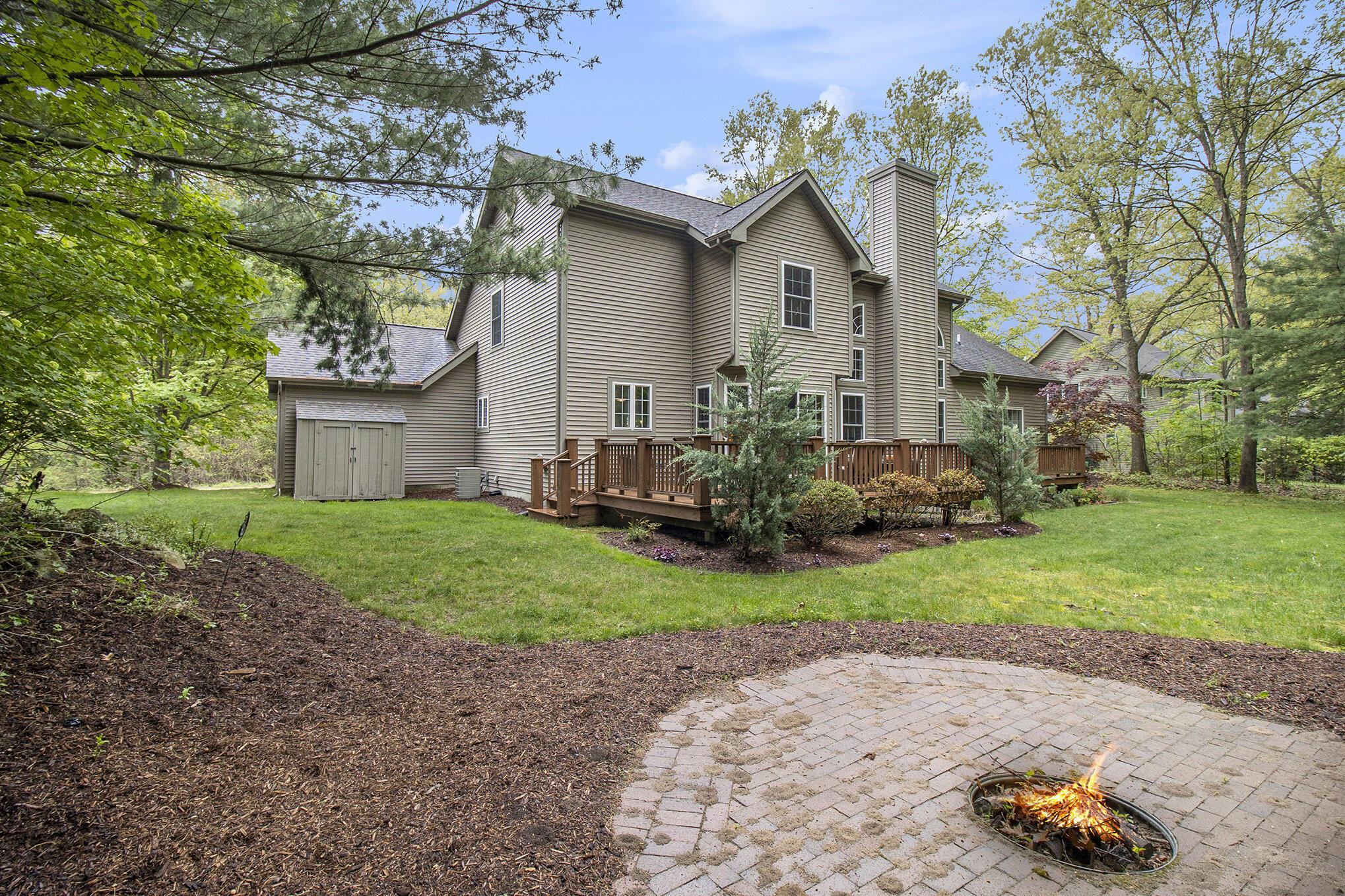 18835 Legacy Point Drive Spring Lake, MI 49456 - Photo 6 of 31 Backyard Firepit