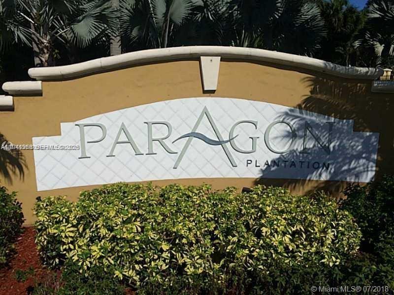 761 North Pine Island Road, Unit 203 Plantation, FL 33324 - Photo 1 of 11 a view of a sign on the side of the road