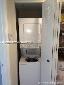 761 North Pine Island Road, Unit 203 Plantation, FL 33324 - Photo 8 of 11 a close view of a washer and dryer