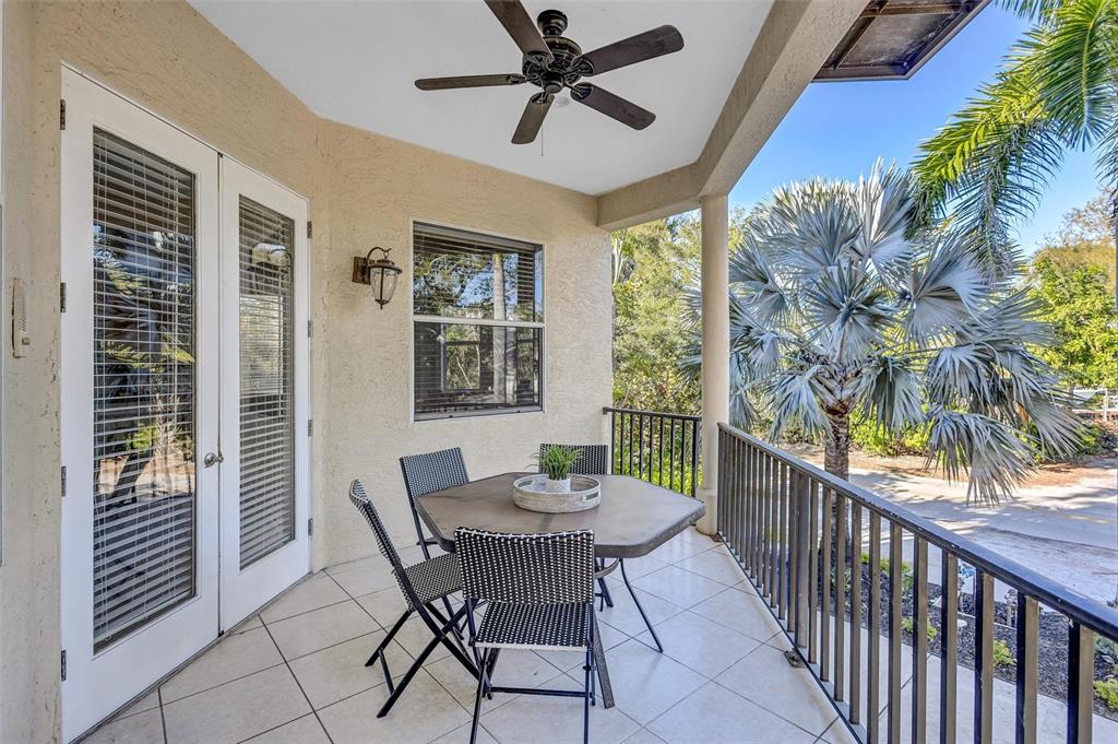436 Canal Road, Unit A Sarasota, FL 34242 - Photo 27 of 94 a view of a dining room with furniture window and wooden floor