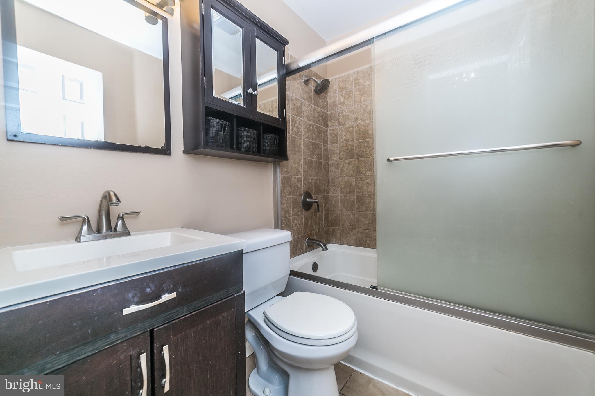 209 Redbud Road Edgewood, MD 21040 - Photo 16 of 30 a bathroom with a sink a toilet and shower