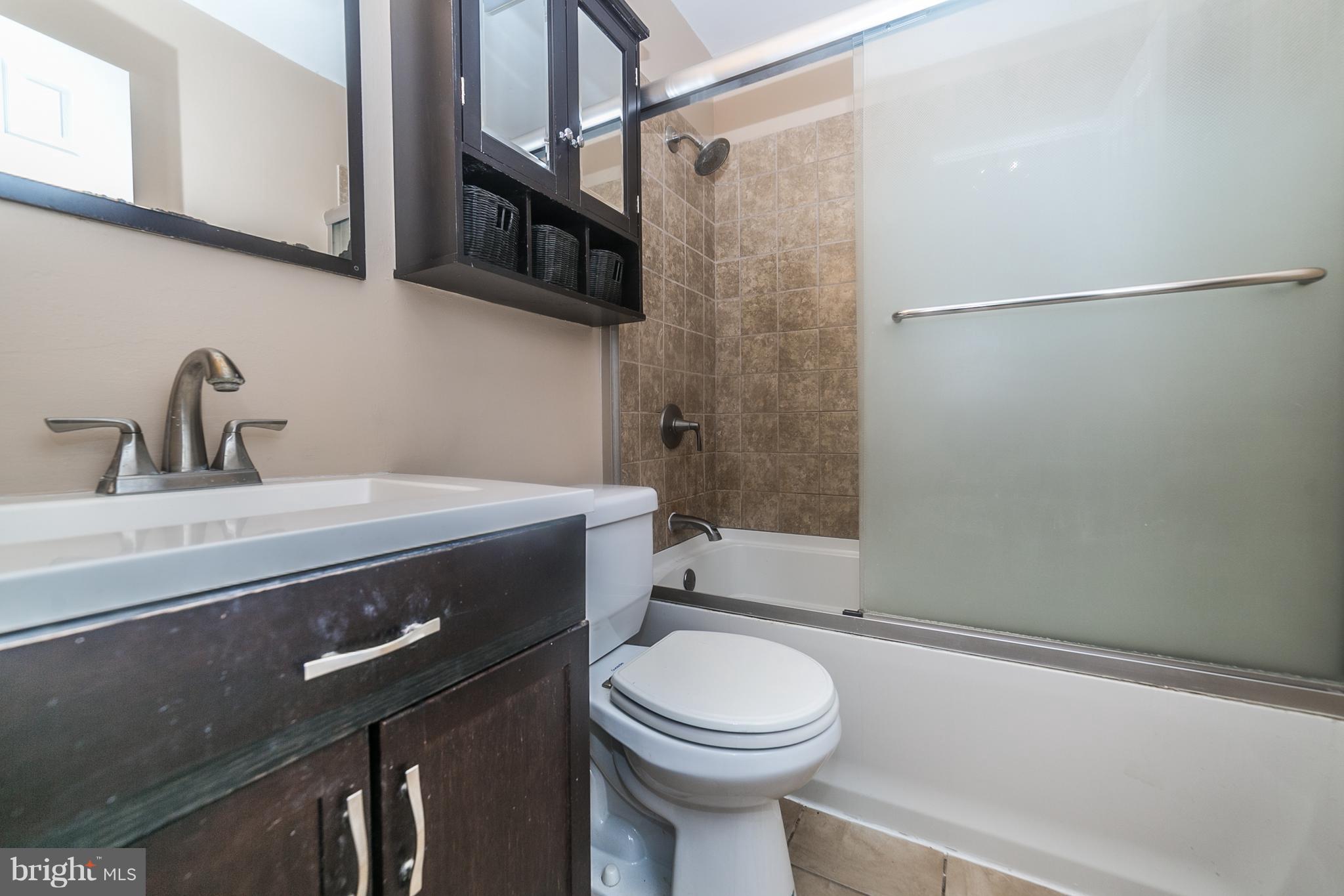 209 Redbud Road Edgewood, MD 21040 - Photo 17 of 30 a bathroom with a sink a toilet and shower