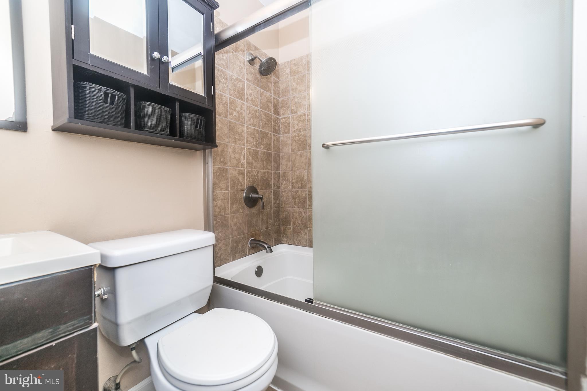 209 Redbud Road Edgewood, MD 21040 - Photo 18 of 30 a white toilet sitting next to a bath tub