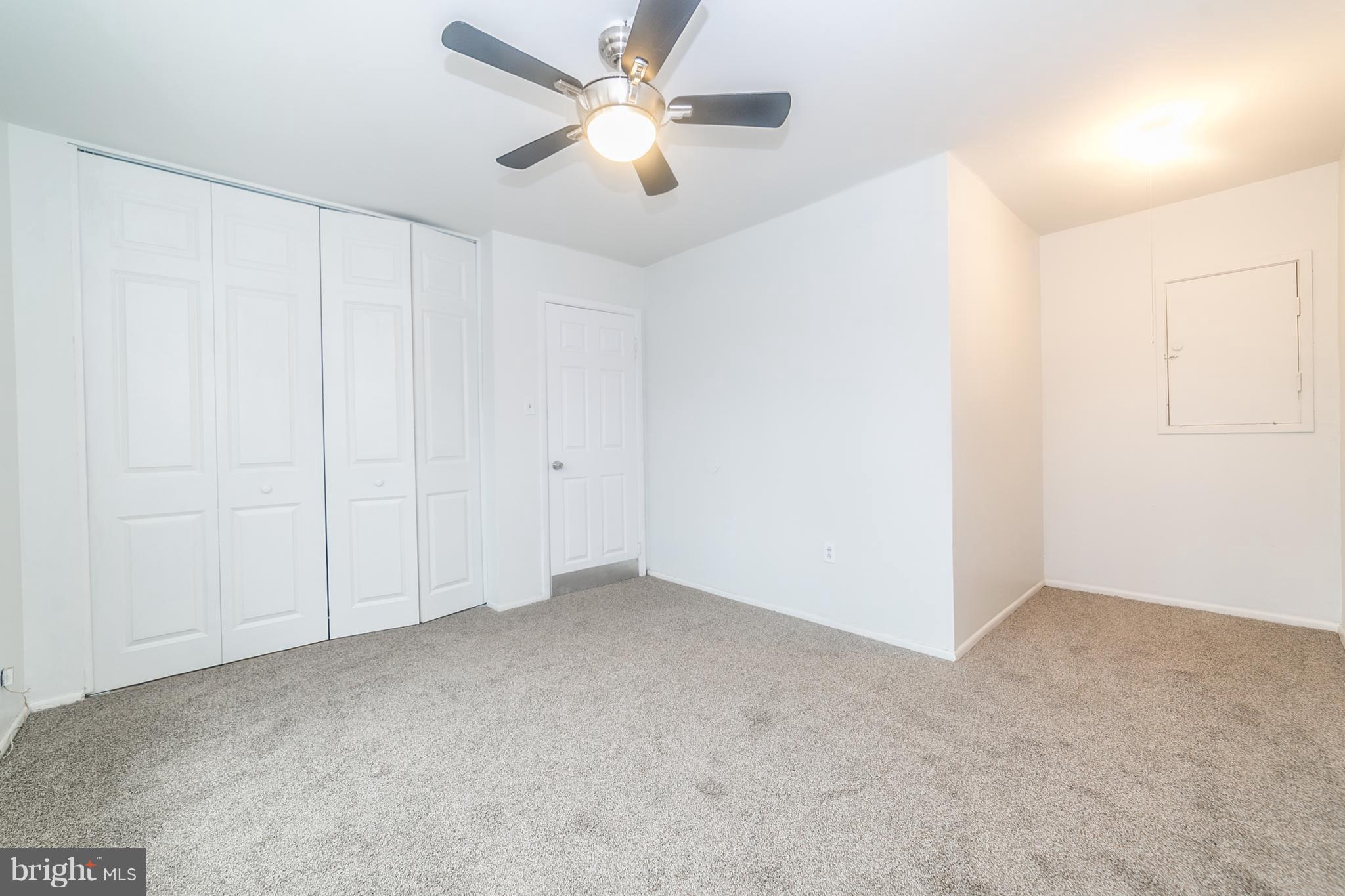 209 Redbud Road Edgewood, MD 21040 - Photo 21 of 30 an empty room with a ceiling fan and a window