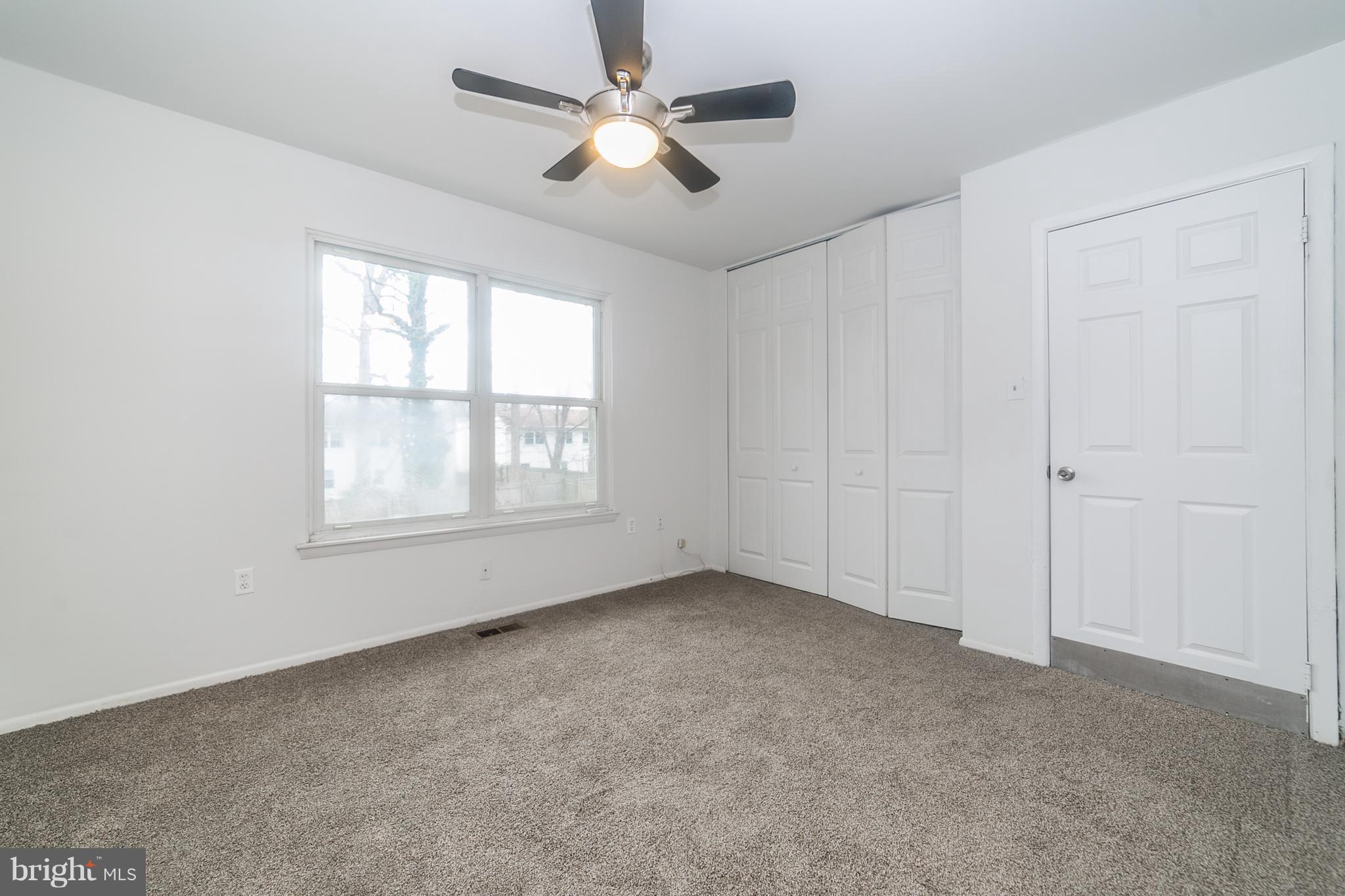 209 Redbud Road Edgewood, MD 21040 - Photo 22 of 30 an empty room with windows and fan
