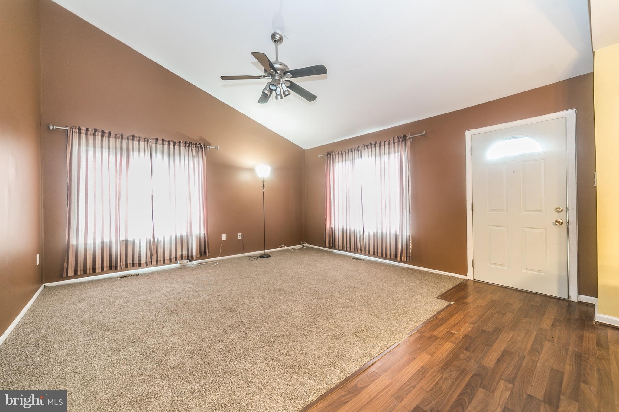 209 Redbud Road Edgewood, MD 21040 - Photo 5 of 30 an empty room with wooden floor and windows