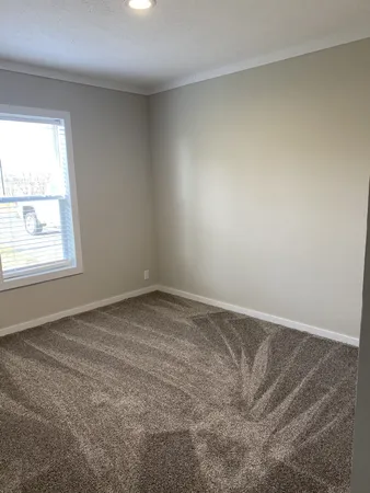 an empty room with a window