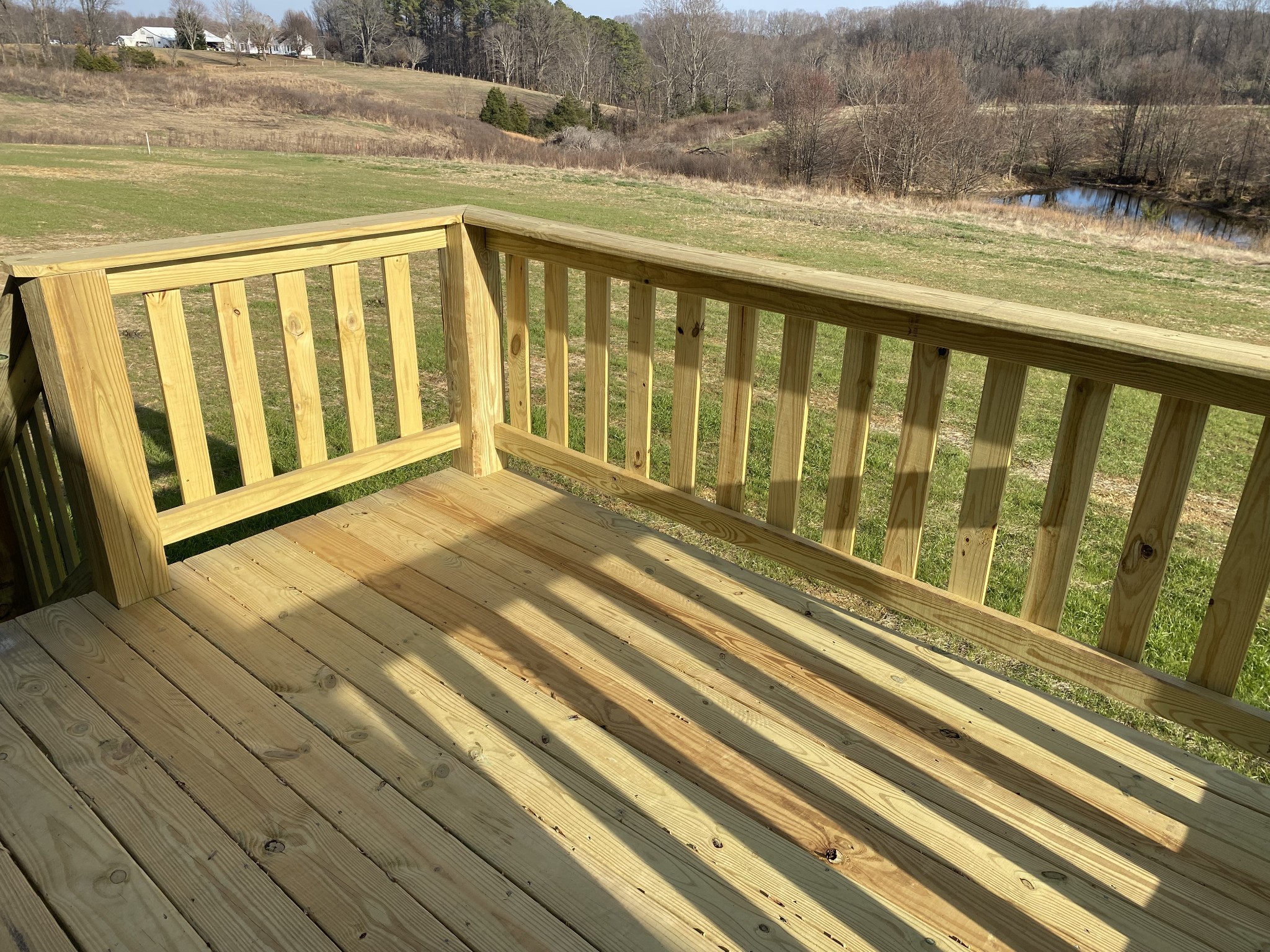 1668 Gamaliel Road Red Boiling Springs, TN 37150 - Photo 21 of 25 a view of a balcony with wooden floor and fence