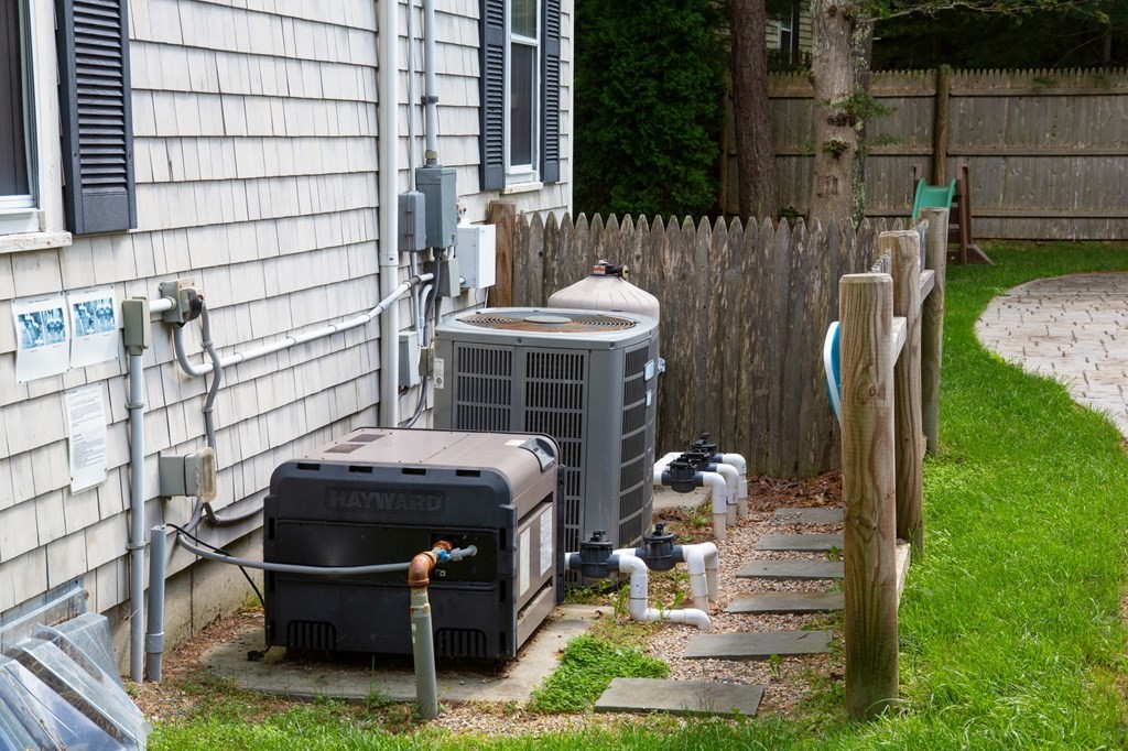 329 White Oak Trail Barnstable, MA 02632 - Photo 13 of 38 a backyard of a house with outdoor seating