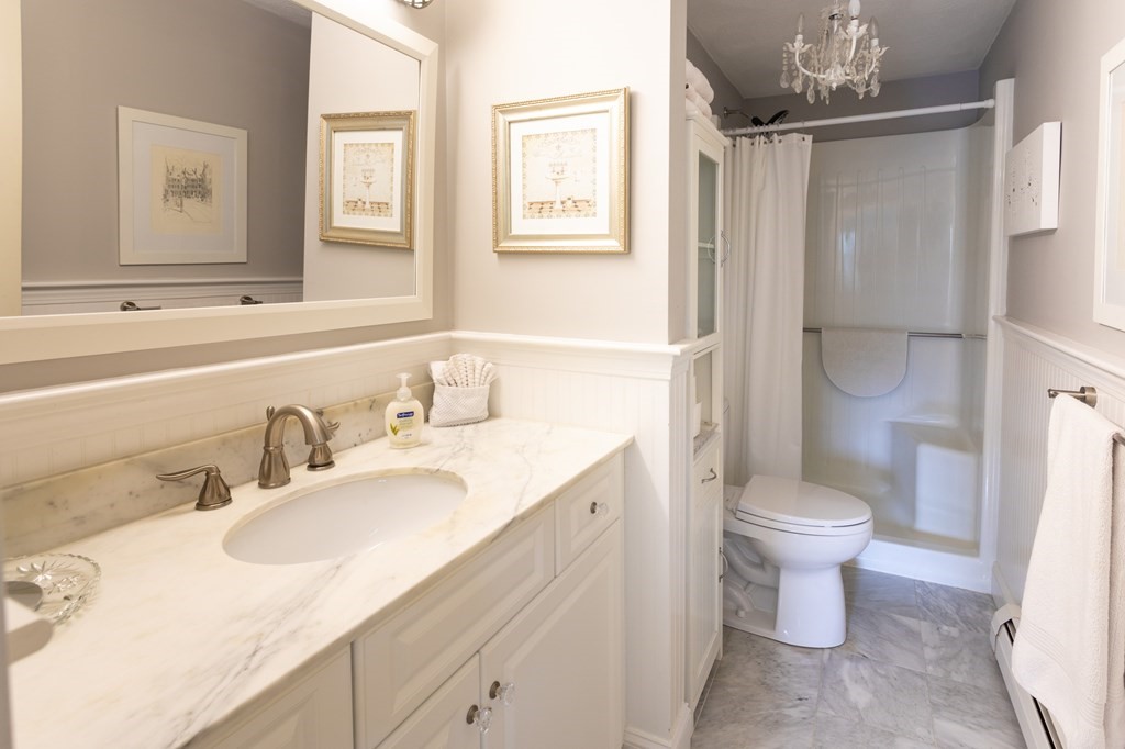 329 White Oak Trail Barnstable, MA 02632 - Photo 29 of 38 a bathroom with a sink toilet and shower