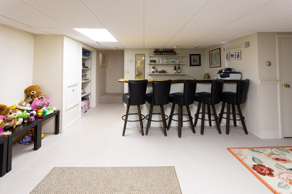 329 White Oak Trail Barnstable, MA 02632 - Photo 34 of 38 a view of a dining room with furniture and wooden floor