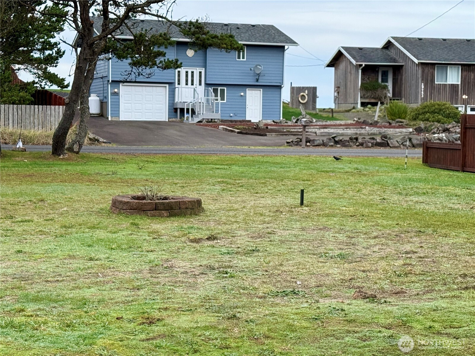 29528 G Street Ocean Park, WA 98640 - Photo 2 of 7 a view of a house with a yard