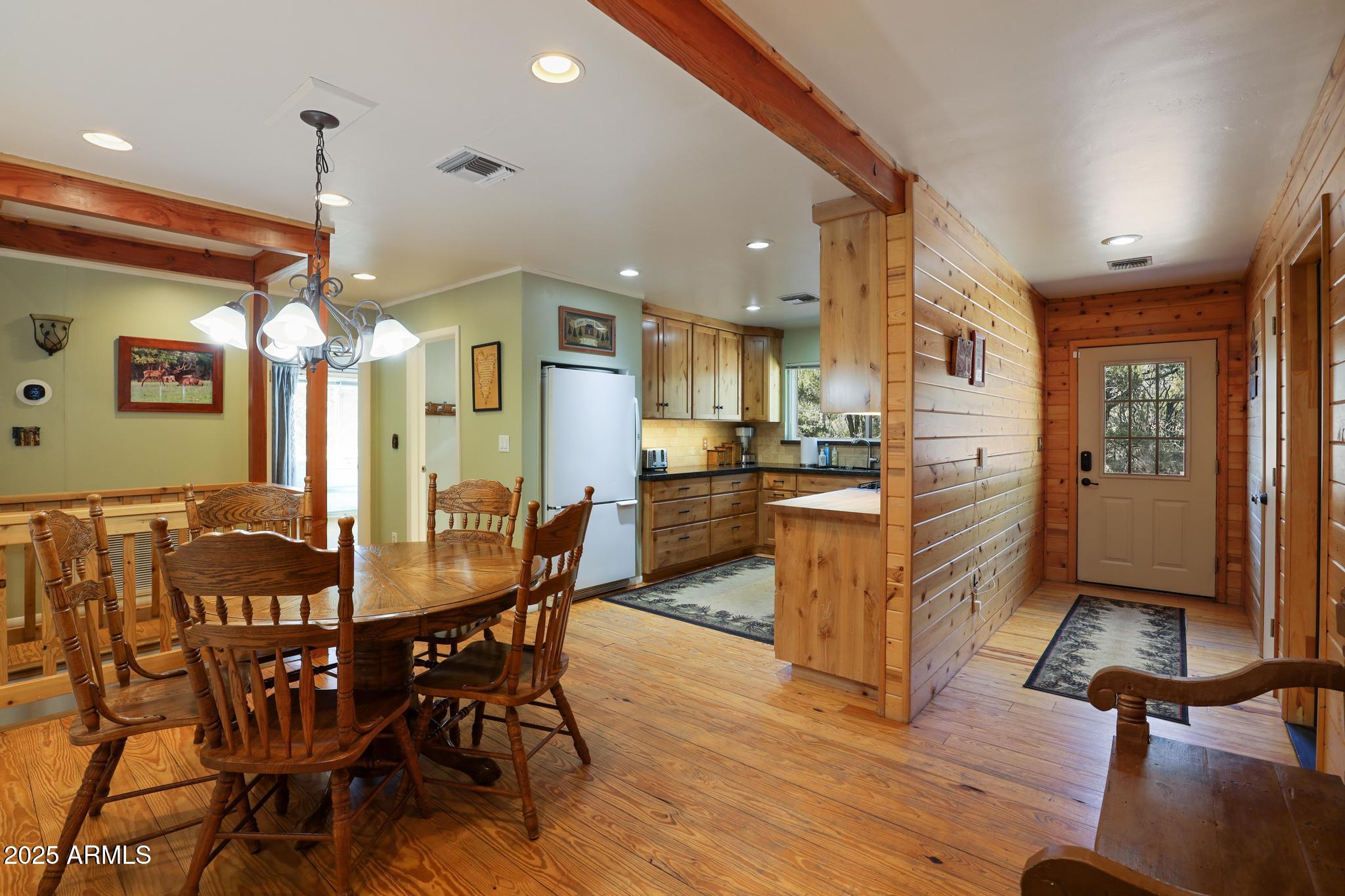 4744 Charles Circle Strawberry, AZ 85544 - Photo 11 of 39 a view of a dining room with furniture