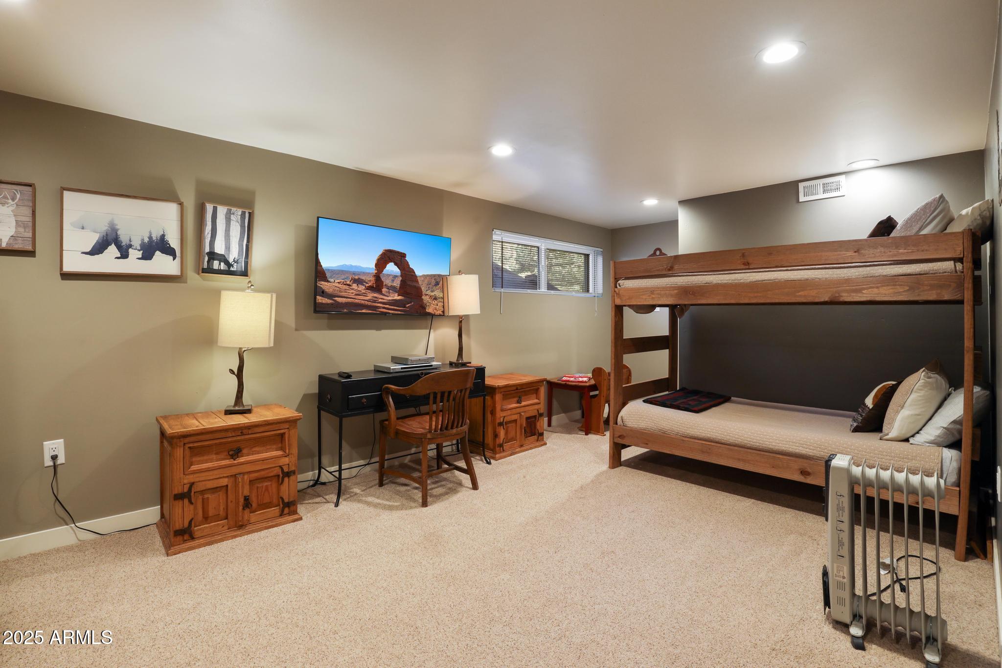 4744 Charles Circle Strawberry, AZ 85544 - Photo 30 of 39 a living room with furniture and a lamp