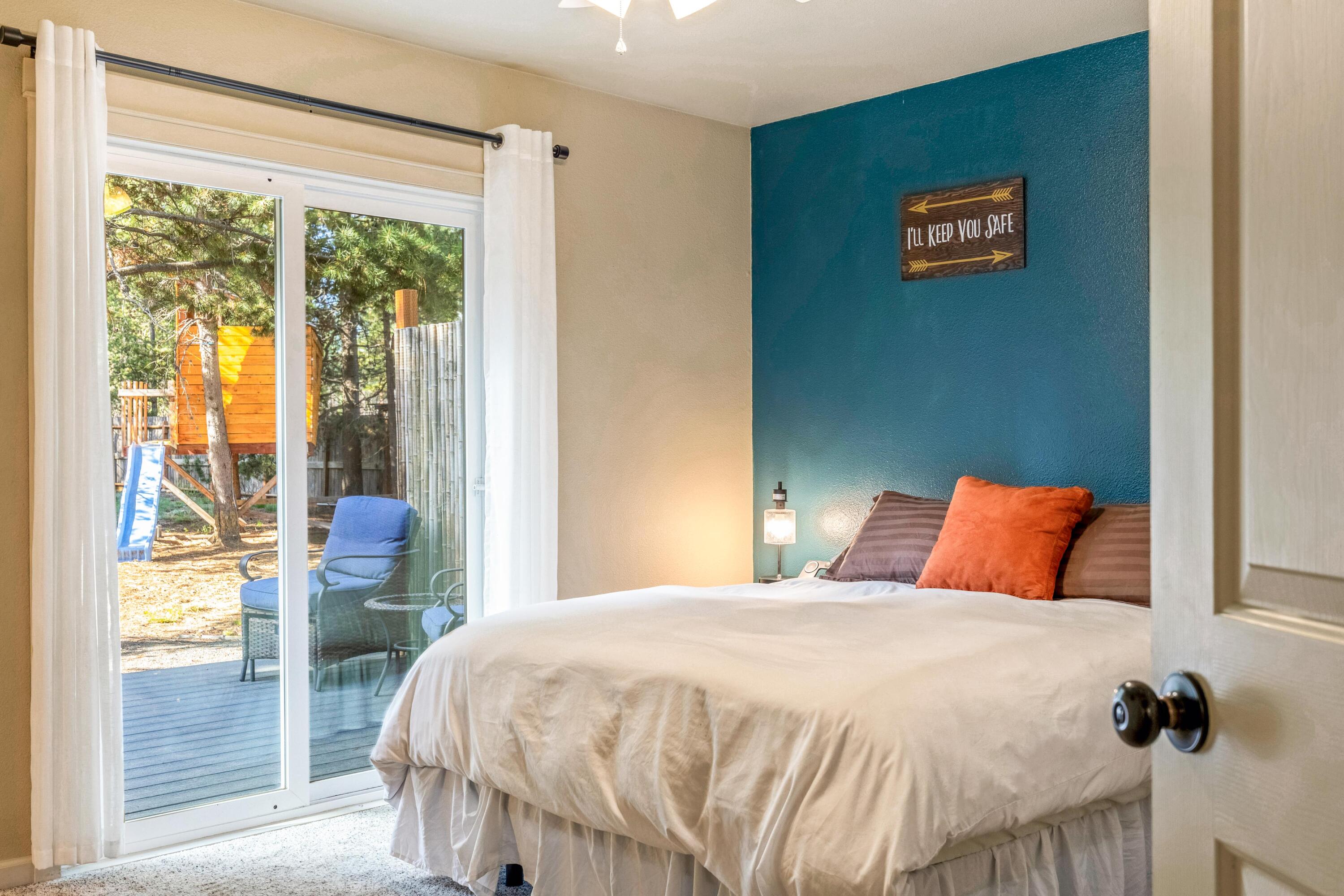 16983 Jacinto Road Bend, OR 97707 - Photo 10 of 29 a bedroom with a bed and a painting on the wall