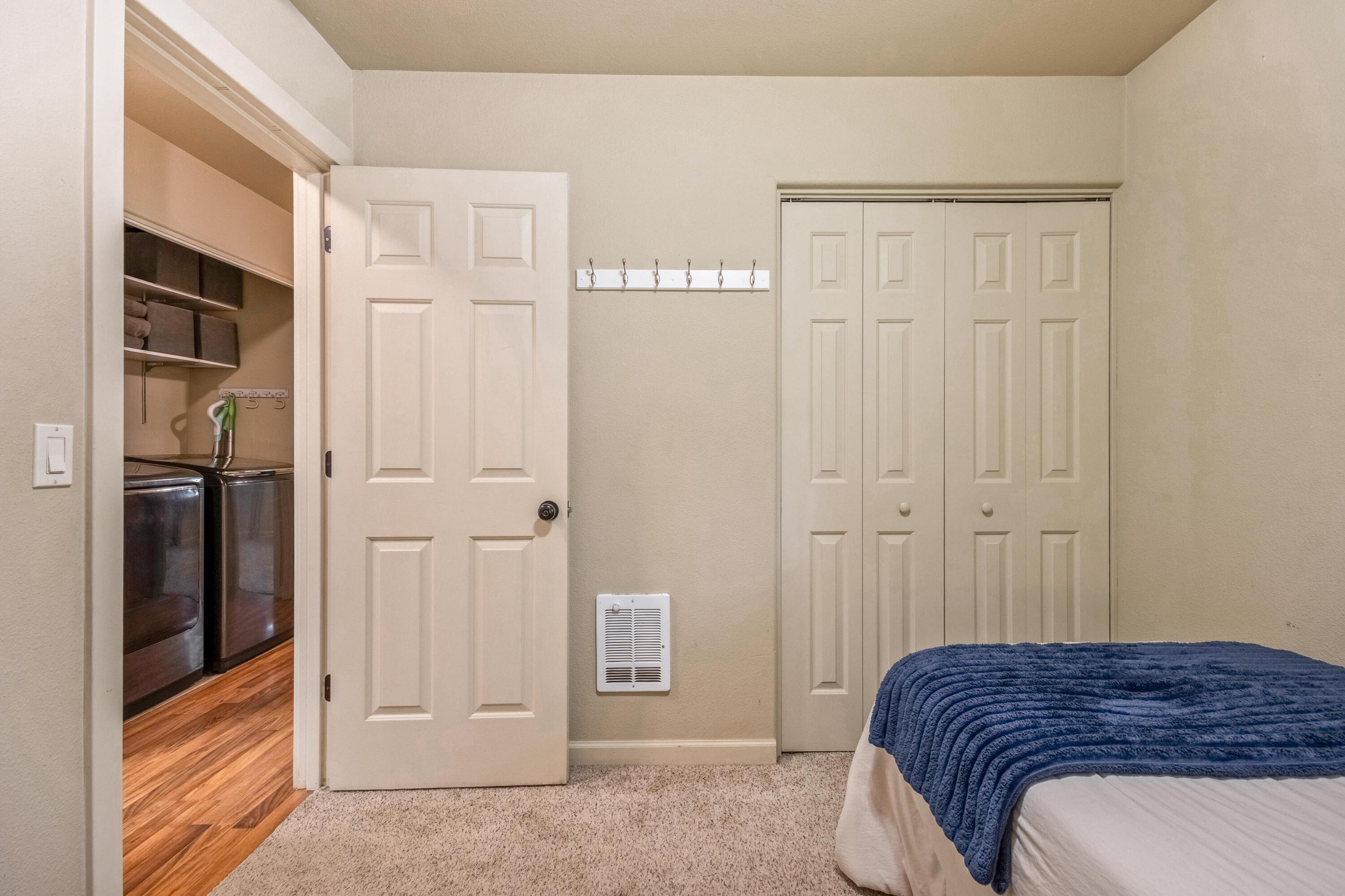 16983 Jacinto Road Bend, OR 97707 - Photo 16 of 29 a bedroom with a bed and a closet