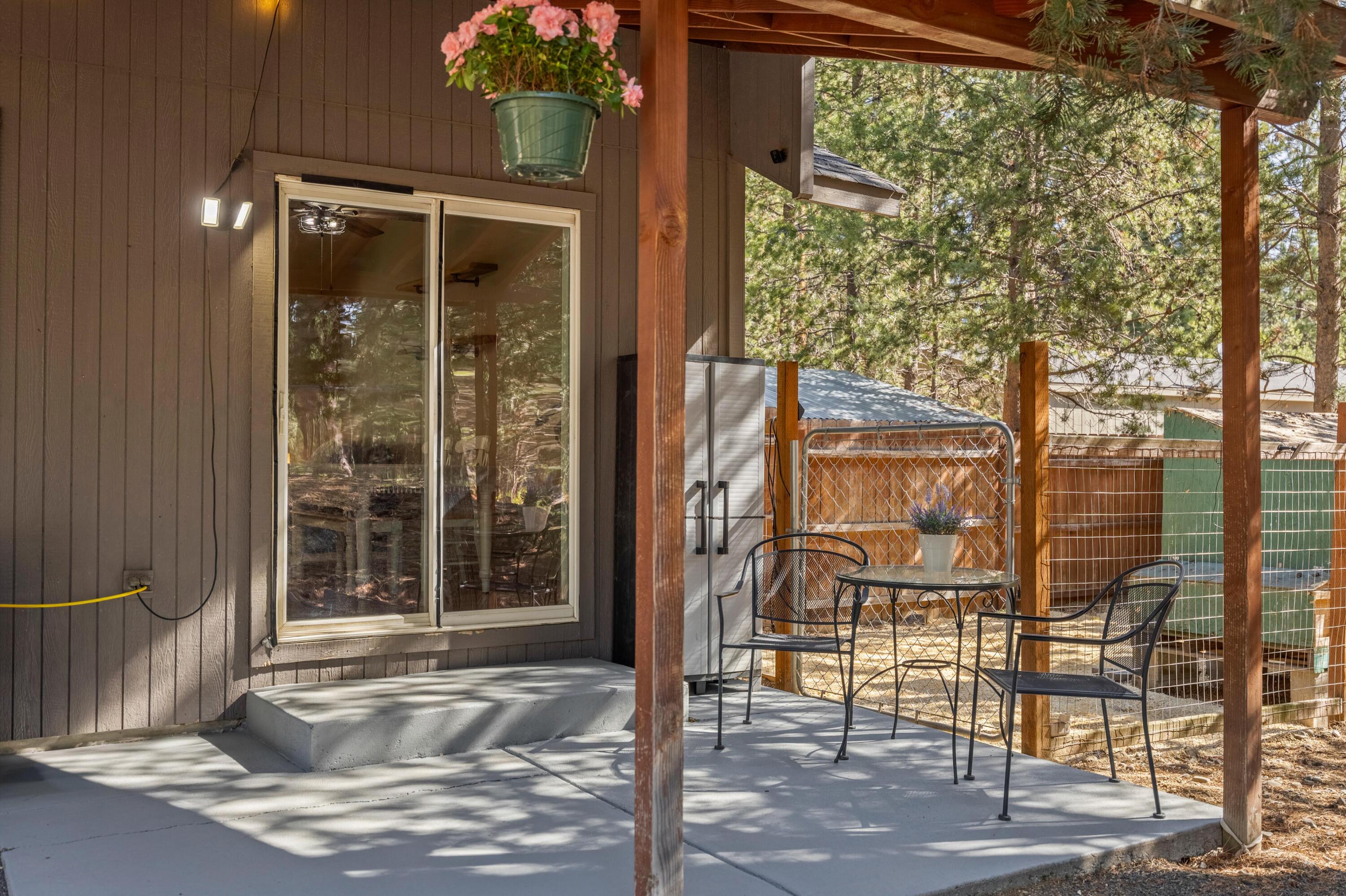 16983 Jacinto Road Bend, OR 97707 - Photo 18 of 29 a view of a building with a door and windows