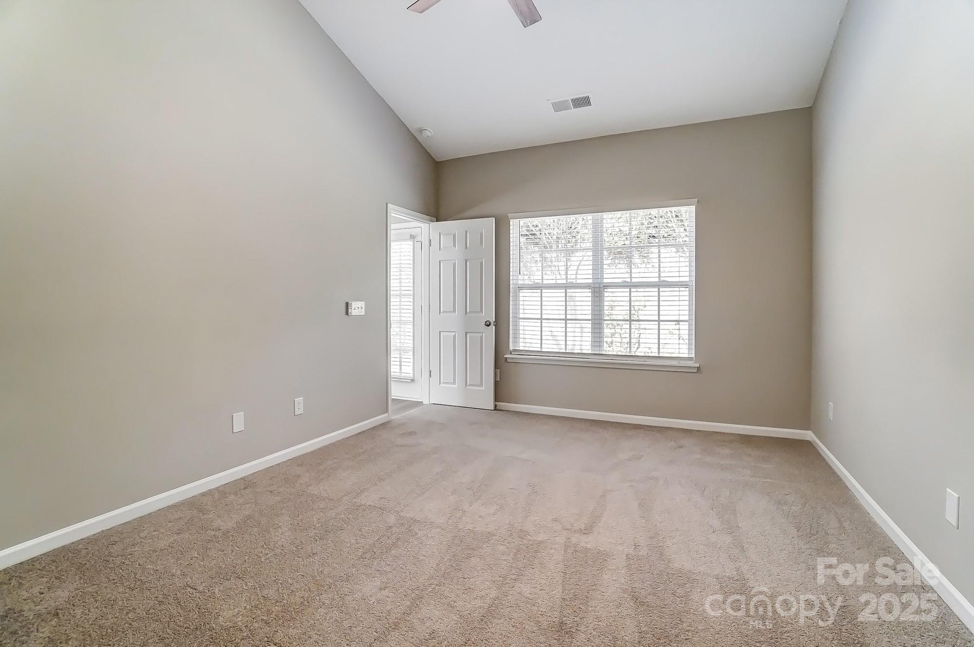 16729 Timber Crossing Road Charlotte, NC 28213 - Photo 21 of 48 an empty room with windows